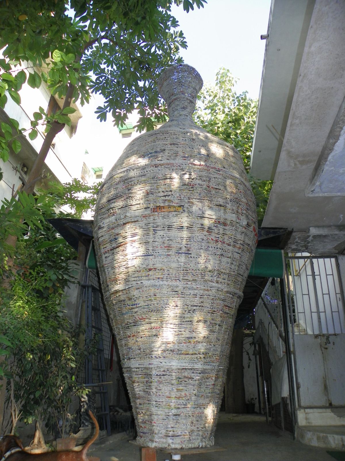 The 16-foot paper-stick pot, built from 5,950 rolled newspapers