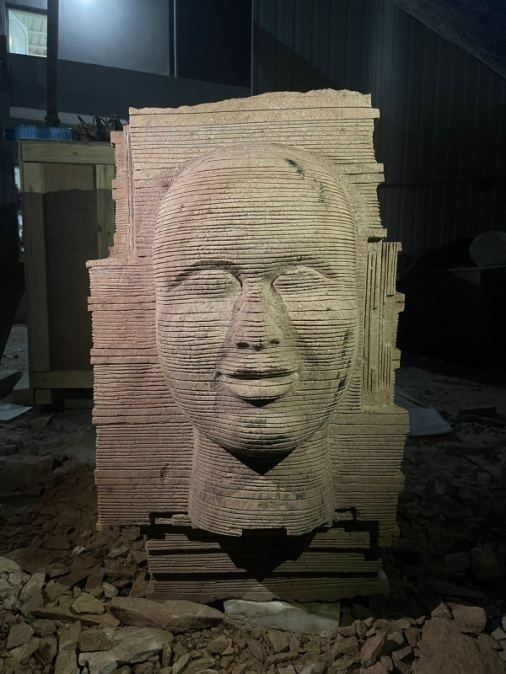 Carving a face in stone